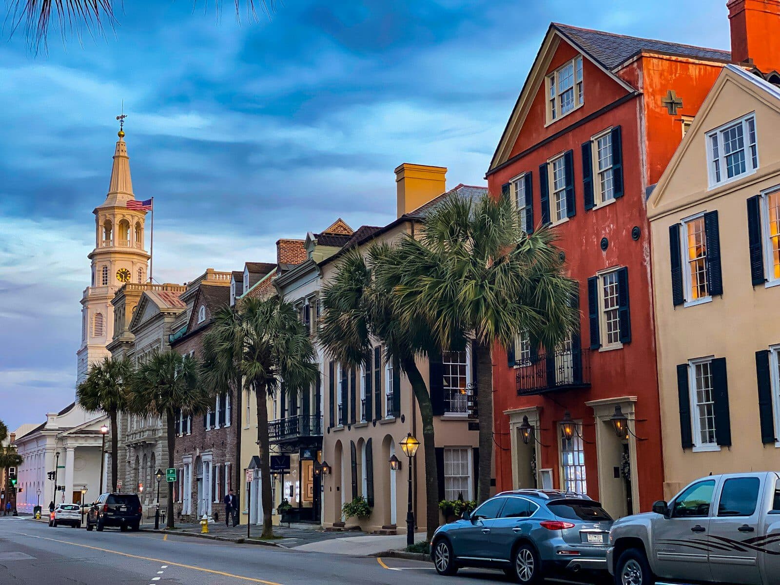 Charleston SC downtown street with historic buildings and palm trees